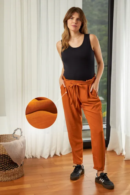 CALÇA GESTANTE CENOURA AJUSTÁVEL OCRE